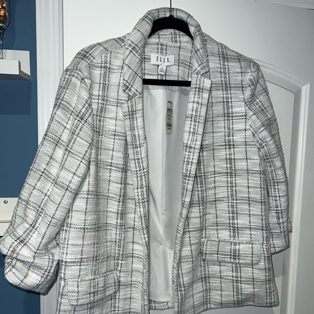 White with black blazer. Brand new, never worn. Tag still on